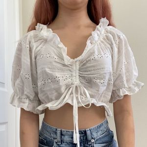 White ruffled crop top with lace detailing